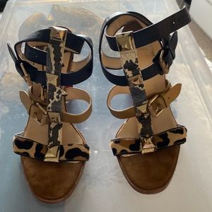 Louboutin suede, snake, leather, studded wrap sandals
